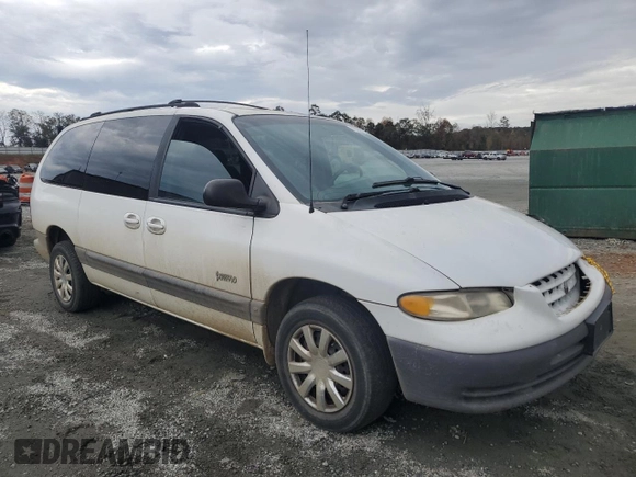 1999 Plymouth Voyager Grand SE z VIN 1P4GP44G7XB831207, wystawiony jako Copart lot #79558714 z przebiegiem 163 620 mil mil oraz Szkody całkowita. Historia ofert i sprzedaży dostępna na DreamBid. Obrazek 4.