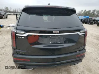 2020 Cadillac XT6 AWD Sport z VIN 1GYKPGRS0LZ173920, wystawiony jako Copart lot #44397305 z przebiegiem 97 071 mil mil oraz Szkoda całkowita • Salvage title. Historia ofert i sprzedaży dostępna na DreamBid. Obrazek 6.