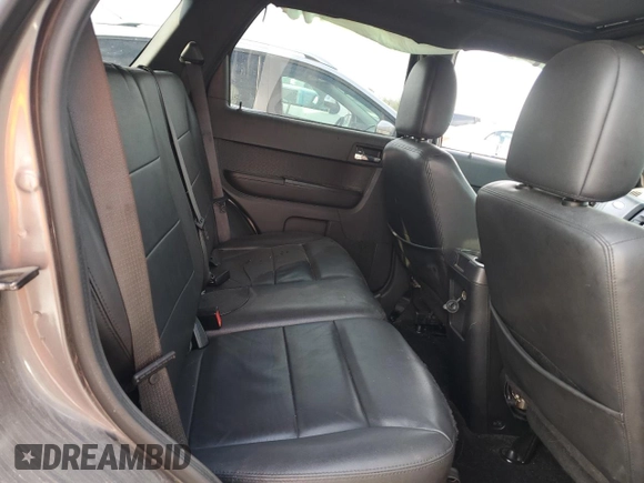 2012 Ford Escape Limited z VIN 1FMCU0EG1CKB30638, wystawiony jako Copart lot #52905205 z przebiegiem 169 683 mil mil oraz Szkoda całkowita • Salvage title. Historia ofert i sprzedaży dostępna na DreamBid. Obrazek 12.