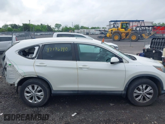 2014 Honda CR-V EX-L with VIN 5J6RM4H74EL014066, listed as a IAAI auction lot 42176490 with 206,016 mi miles and . Bid and sale history available at DreamBid. Image 14.