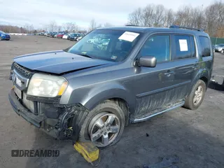 2011 Honda Pilot EX with VIN 5FNYF4H4XBB008594, listed as a IAAI auction lot 41619594 with 171,237 mi miles. Bid and sale history available at carsss.com. Image 17.