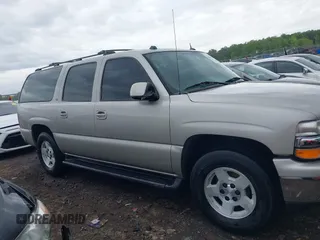 2005 Chevrolet Suburban LT z VIN 3GNEC16ZX5G197892, wystawiony jako IAAI lot #42045100 z przebiegiem 262 665 mil mil oraz . Historia ofert i sprzedaży dostępna na DreamBid. Obrazek 13.