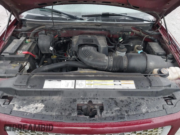 1999 Ford F-150 XL with VIN 2FTRX18L1XCA54790, listed as a IAAI auction lot 41556984 with 257,673 mi miles. Bid and sale history available at carsss.com. Image 10.