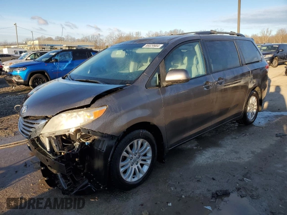 2011 Toyota Sienna XLE AAS with VIN 5TDYK3DC1BS170855, listed as a Copart auction lot 86829904 with 142,117 mi miles and Salvage Title. Bid and sale history available at carsss.com. Image 1.