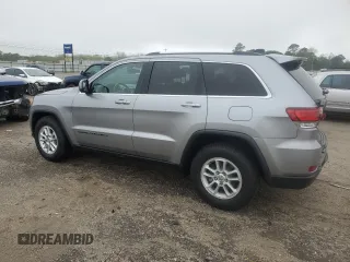 2020 Jeep Grand Cherokee Laredo E with VIN 1C4RJEAG0LC373572, listed as a Copart auction lot 52040195 with 86,604 mi miles and Salvage title. Bid and sale history available at DreamBid. Image 2.