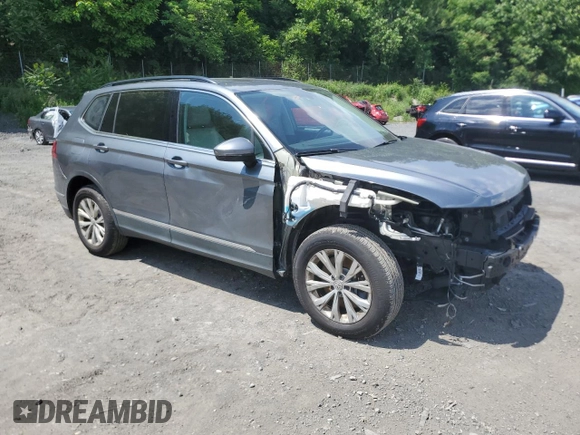2018 Volkswagen Tiguan SEL with VIN 3VV2B7AXXJM060858, listed as a Copart auction lot 60639885 with 119,148 mi miles and Salvage title. Bid and sale history available at DreamBid. Image 4.