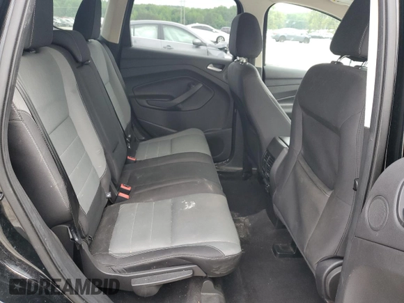 2016 Ford Escape SE z VIN 1FMCU0GX9GUB56962, wystawiony jako Copart lot #57071515 z przebiegiem 150 792 mil mil oraz Szkoda całkowita • Salvage title. Historia ofert i sprzedaży dostępna na DreamBid. Obrazek 11.