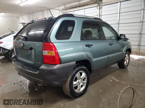 2005 Kia Sportage LX with VIN KNDJE723657083048, listed as a Copart auction lot 85794364 with 172,420 mi miles and Salvage Title. Bid and sale history available at carsss.com. Image 3.
