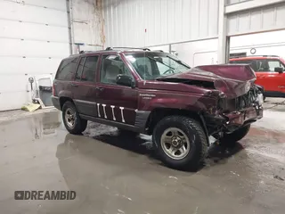 1995 Jeep Grand Cherokee Laredo with VIN 1J4GZ58S2SC679918, listed as a IAAI auction lot 41840415 with 261,434 mi miles. Bid and sale history available at carsss.com. Image 1.