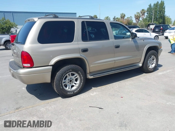 2003 Dodge Durango SLT z VIN 1D4HS48N43F517701, wystawiony jako IAAI lot #42277135 z przebiegiem 135 521 mil mil oraz . Historia ofert i sprzedaży dostępna na DreamBid. Obrazek 4.