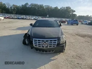 2012 Cadillac CTS z VIN 1G6DA1E30C0106642, wystawiony jako Copart lot #43330145 z przebiegiem 101 063 mil mil oraz Szkoda całkowita • Salvage title. Historia ofert i sprzedaży dostępna na DreamBid. Obrazek 11.
