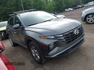 2023 Hyundai Tucson SEL z VIN 5NMJBCAE5PH263198, wystawiony jako IAAI lot #42519294 z przebiegiem 52 410 mil mil oraz . Historia ofert i sprzedaży dostępna na DreamBid. Obrazek 1.