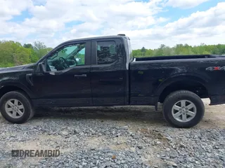 2023 Ford F-150 XL with VIN 1FTEX1EP8PKD51248, listed as a IAAI auction lot 42237097 with 90,886 mi miles and . Bid and sale history available at DreamBid. Image 14.