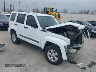 2012 Jeep Liberty Sport z VIN 1C4PJMAK7CW142933, wystawiony jako IAAI lot #41426608 z przebiegiem 198 692 mil mil oraz . Historia ofert i sprzedaży dostępna na DreamBid. Obrazek 1.