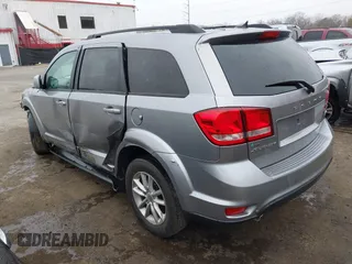 2016 Dodge Journey SXT with VIN 3C4PDCBG4GT122761, listed as a IAAI auction lot 41751265 with 130,304 mi miles. Bid and sale history available at carsss.com. Image 3.