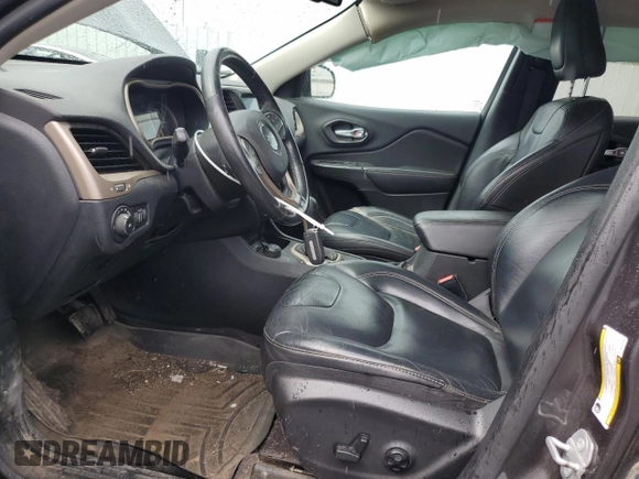 2016 Jeep Cherokee Limited with VIN 1C4PJMDBXGW261559, listed as a Copart auction lot 60042415 with 94,637 mi miles and Salvage title. Bid and sale history available at DreamBid. Image 7.