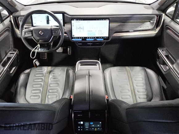 2022 Rivian R1T Adventure z VIN 7FCTGAAA5NN007486, wystawiony jako Copart lot #52649075 z przebiegiem 23 292 mil mil oraz Czysty tytuł • Clean title. Historia ofert i sprzedaży dostępna na DreamBid. Obrazek 8.