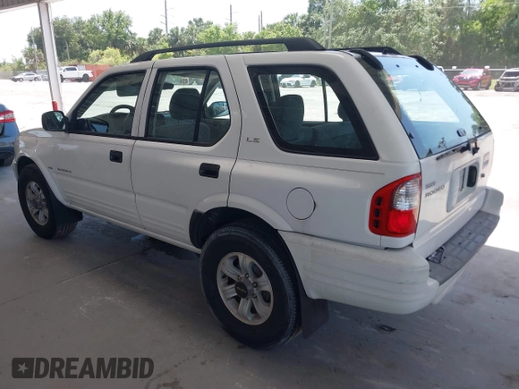 2000 Isuzu Rodeo S z VIN 4S2CK58WXY4317404, wystawiony jako IAAI lot #42261101 z przebiegiem 192 918 mil mil oraz . Historia ofert i sprzedaży dostępna na DreamBid. Obrazek 3.