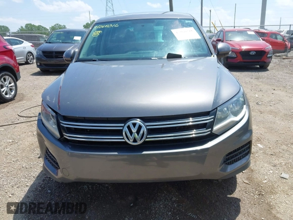 2012 Volkswagen Tiguan SE with VIN WVGAV7AX9CW004362, listed as a IAAI auction lot 42260316 with 163,444 mi miles and . Bid and sale history available at DreamBid. Image 12.