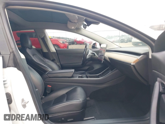 2019 Tesla Model 3 Mid Range with VIN 5YJ3E1EA8KF472540, listed as a IAAI auction lot 41661312 with 75,575 mi miles and . Bid and sale history available at DreamBid. Image 5.