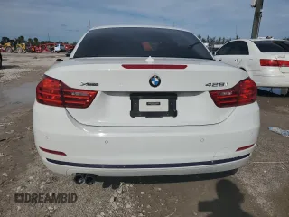 2016 BMW 4 Series 428i xDrive with VIN WBA3T1C52GP822072, listed as a Copart auction lot 87244184 with 80,946 mi miles and Salvage title. Bid and sale history available at DreamBid. Image 6.