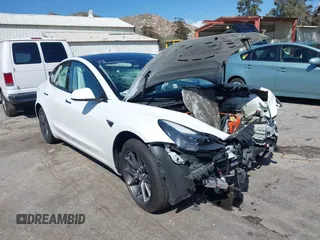 2023 Tesla Model 3 with VIN 5YJ3E1EA4PF462627, listed as a IAAI auction lot 41750103 with 38,463 mi miles. Bid and sale history available at carsss.com. Image 1.