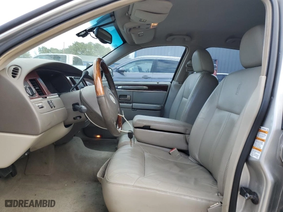 2003 Lincoln Town Car Cartier with VIN 1LNHM83W23Y639990, listed as a Copart auction lot 85591924 with 124,515 mi miles and Salvage Title. Bid and sale history available at carsss.com. Image 7.