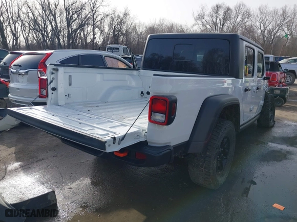 2023 Jeep Gladiator Mojave with VIN 1C6JJTEG6PL575342, listed as a IAAI auction lot 41785481 with 25,093 mi miles. Bid and sale history available at carsss.com. Image 4.