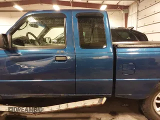 2009 Ford Ranger XLT with VIN 1FTZR45E69PA15146, listed as a IAAI auction lot 41575841 with 155,269 mi miles. Bid and sale history available at carsss.com. Image 19.