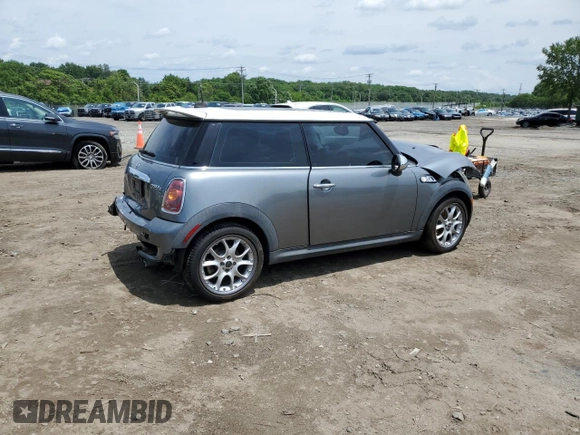 2007 MINI Hardtop S with VIN WMWMF73577TT84087, listed as a Copart auction lot 60208895 with 76,248 mi miles and Salvage title. Bid and sale history available at DreamBid. Image 3.