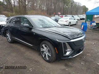 2024 Cadillac LYRIQ Tech z VIN 1GYKPMRK3RZ128543, wystawiony jako IAAI lot #41959885 z przebiegiem 9 403 mil mil oraz . Historia ofert i sprzedaży dostępna na DreamBid. Obrazek 1.