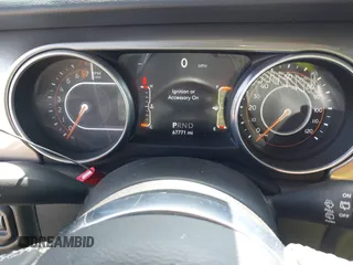 2018 Jeep Wrangler Unlimited Sahara z VIN 1C4HJXEG2JW211116, wystawiony jako IAAI lot #42250718 z przebiegiem 67 771 mil mil oraz . Historia ofert i sprzedaży dostępna na DreamBid. Obrazek 7.