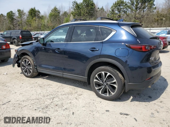 2022 Mazda CX-5 2.5 S Premium Package with VIN JM3KFBDMXN0559814, listed as a Copart auction lot 50985535 with 34,612 mi miles and Salvage Title. Bid and sale history available at carsss.com. Image 2.