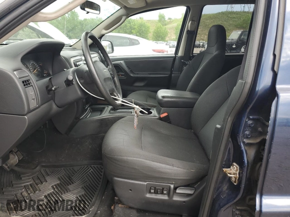 2004 Jeep Grand Cherokee Laredo with VIN 1J4GW48S04C125931, listed as a Copart auction lot 59972695 with 198,403 mi miles and Salvage title. Bid and sale history available at DreamBid. Image 7.