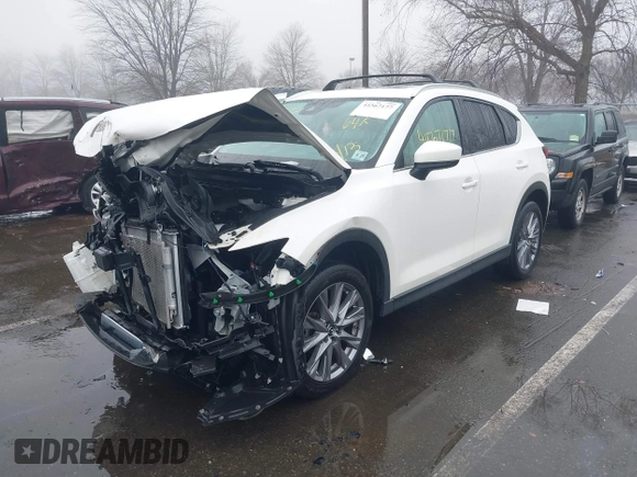2020 Mazda CX-5 Grand Touring with VIN JM3KFBDMXL0785865, listed as a IAAI auction lot 41567177 with 64,519 mi miles. Bid and sale history available at carsss.com. Image 6.