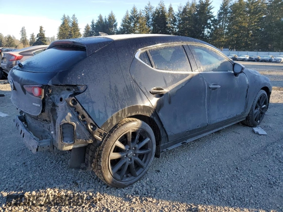 2022 Mazda Mazda3 Hatchback Premium with VIN JM1BPBML0N1519877, listed as a Copart auction lot 41886985 with 27,528 mi miles and Salvage Title. Bid and sale history available at carsss.com. Image 3.