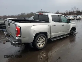 2015 GMC Canyon 4WD SLT with VIN 1GTG6CE35F1251486, listed as a Copart auction lot 46884015 with 162,144 mi miles and Salvage Title. Bid and sale history available at carsss.com. Image 3.