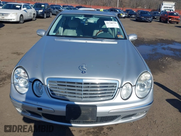 2006 Mercedes-Benz E-Class 3.5L with VIN WDBUF56J06A737827, listed as a IAAI auction lot 41748739 with 197,843 mi miles. Bid and sale history available at carsss.com. Image 12.