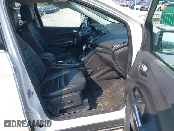 2015 Ford Escape Titanium with VIN 1FMCU0JXXFUA07175, listed as a IAAI auction lot 42447067 with 94,893 mi miles and . Bid and sale history available at DreamBid. Image 5.