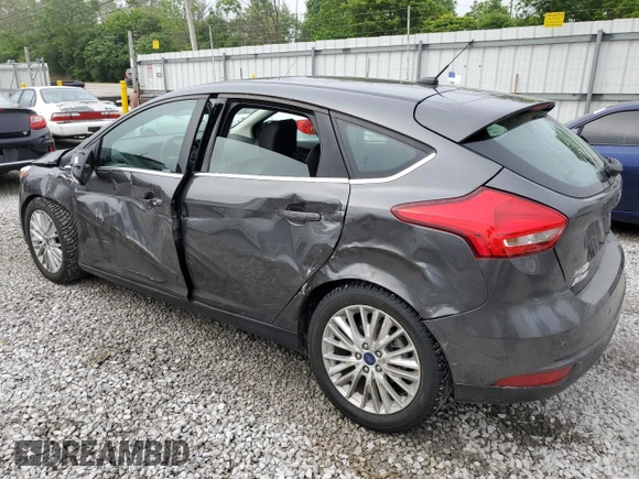 2018 Ford Focus Titanium with VIN 1FADP3N2XJL232751, listed as a Copart auction lot 58361415 with 31,542 mi miles and Salvage title. Bid and sale history available at DreamBid. Image 2.