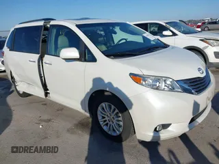 2016 Toyota Sienna XLE with VIN 5TDYK3DC6GS758189, listed as a IAAI auction lot 41598251 with 129,050 mi miles. Bid and sale history available at carsss.com. Image 1.