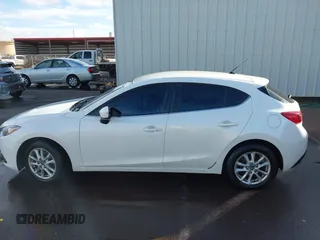 2014 Mazda 3 i Touring with VIN JM1BM1L77E1117166, listed as a IAAI auction lot 41336048 with 88,808 mi miles and . Bid and sale history available at DreamBid. Image 14.