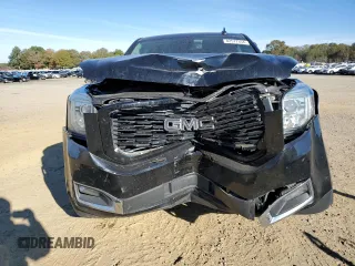 2018 GMC Yukon Denali with VIN 1GKS2CKJ3JR404177, listed as a Copart auction lot 82577354 with 129,744 mi miles and Salvage Title. Bid and sale history available at carsss.com. Image 5.