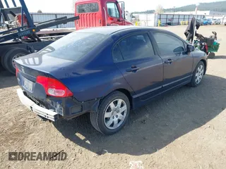 2007 Honda Civic Sdn LX with VIN 1HGFA16587L124463, listed as a IAAI auction lot 42042736 with 189,929 mi miles. Bid and sale history available at carsss.com. Image 4.