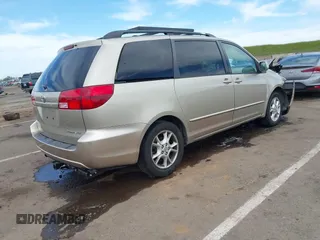 2005 Toyota Sienna XLE with VIN 5TDZA22C65S349045, listed as a IAAI auction lot 42014639 with 99,940 mi miles. Bid and sale history available at carsss.com. Image 4.