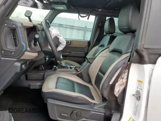2024 Ford Bronco Wildtrak z VIN 1FMEE2BP4RLA19493, wystawiony jako Copart lot #57669545 z przebiegiem 12 065 mil mil oraz Szkoda całkowita • Salvage title. Historia ofert i sprzedaży dostępna na DreamBid. Obrazek 7.