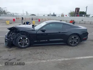 2021 Ford Mustang EcoBoost z VIN 1FA6P8TH7M5115490, wystawiony jako IAAI lot #42428724 z przebiegiem 47 417 mil mil oraz . Historia ofert i sprzedaży dostępna na DreamBid. Obrazek 14.