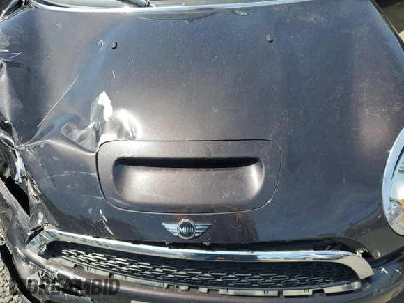 2013 MINI Convertible S with VIN WMWZP3C51DT551373, listed as a Copart auction lot 57878745 with 110,181 mi miles and Salvage title. Bid and sale history available at DreamBid. Image 11.