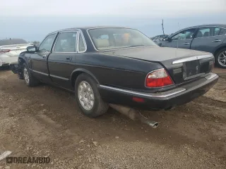 2000 Jaguar XJ with VIN SAJDA14C7YLF11390, listed as a Copart auction lot 73054184 with 0 mi miles and Salvage Title. Bid and sale history available at carsss.com. Image 2.