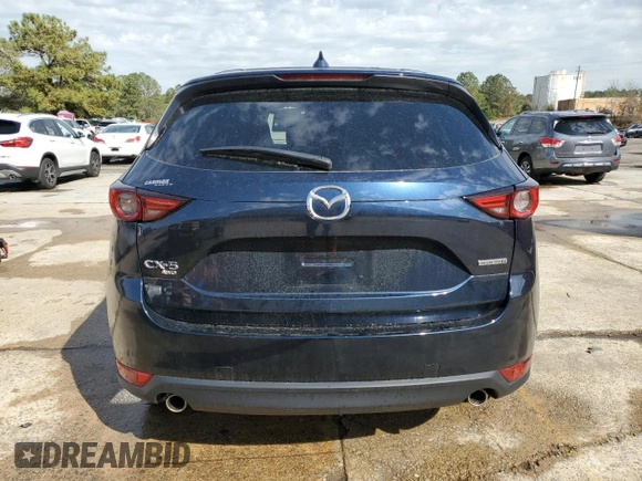 2021 Mazda CX-5 Grand Touring with VIN JM3KFBDM8M0489180, listed as a Copart auction lot 49900525 with 34,687 mi miles and Salvage Title. Bid and sale history available at carsss.com. Image 6.